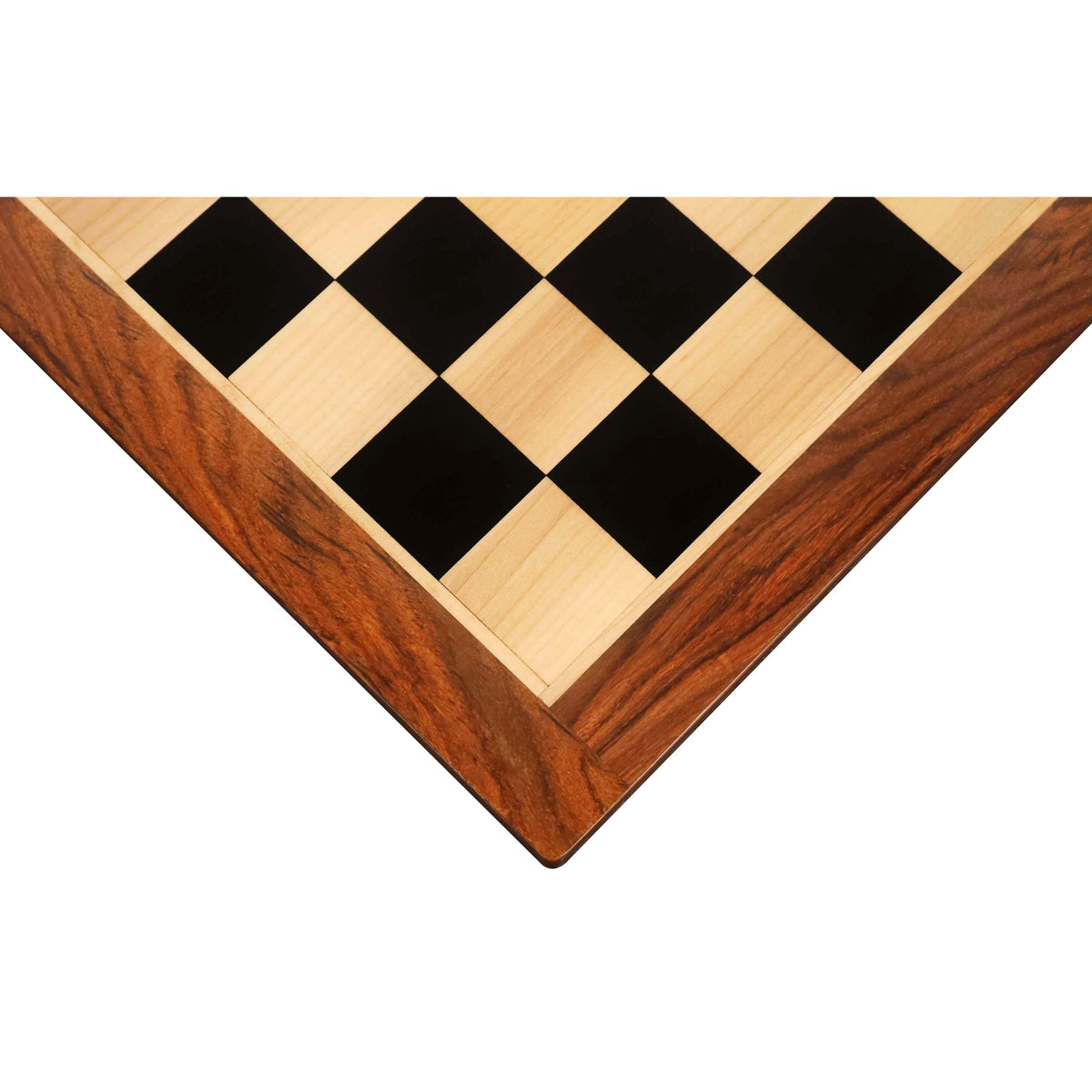 Close-up corner view of a 21 inch Ebony and Maple wood chessboard with Golden Rosewood borders.