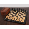 Full Fierce Knight Staunton Ebonized set on a chessboard with the open storage box beside it.