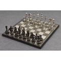 Elevated shot of the Soviet-inspired brass metal chess set and board.