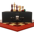 4.5-inch Carvers' Art luxury chess set in budrose wood with storage box and board.