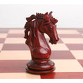 Side profile of the elegant bud rosewood Goliath Series Knight chess piece.