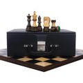 Burnt Zagreb chess set with pieces on a borderless wooden board and a leatherette storage coffer.