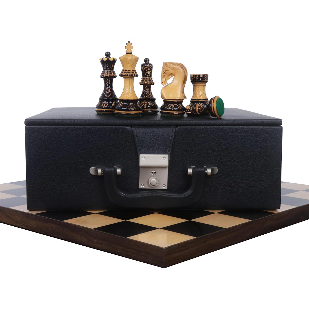 Burnt Zagreb chess set with pieces on a borderless wooden board and a leatherette storage coffer.