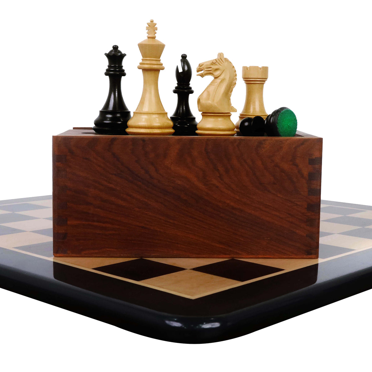 Fierce Knight chess pieces on a wooden storage box and board.