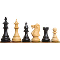 Mixed lineup of 3.7" British Staunton weighted chess pieces in ebonised boxwood and natural boxwood.