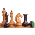 Mixed group of Candidates Series minimalist chess pieces in rosewood and antiqued boxwood, featuring a felt-bottomed pawn.