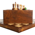 Russian Zagreb chess pieces in golden rosewood and boxwood on a wooden board.