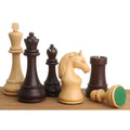 Piatigorsky Cup 5-inch chess pieces in mahogany-stained boxwood and boxwood arranged on a wooden board.