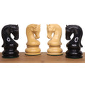 Detailed close-up of handcrafted ebonised boxwood and boxwood knights from the Leningrad Staunton set.