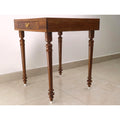 Side view of the handcrafted Golden Rosewood chess table showing the elegant turned wooden legs and high-gloss finish.