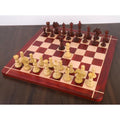 Complete luxury Staunton chess set with bud rosewood and boxwood pieces arranged on a wooden board.