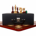 Luxury Stallion Staunton chess pieces on a leatherette storage box and chessboard.