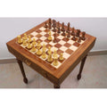4.1" Pro Staunton weighted wooden chess pieces arranged on a 23" tournament-size chess board table.