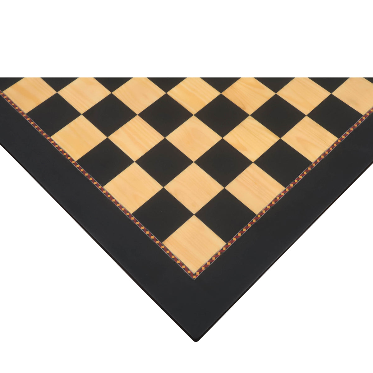 Close-up corner detail of the 21-inch Queens Gambit printed chess board in ebony and maple.