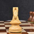 Front view of a carved boxwood Dubrovnik knight chess piece.