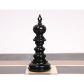 Hand-carved ebony wood Staunton king chess piece.