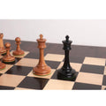 Top-down view of the 19th Century B & Co reproduction chess set highlighting the symmetrical carving of the King and Queen.