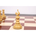 Close-up of a hand-carved white bishop piece from the Marengo luxury Staunton chess set.