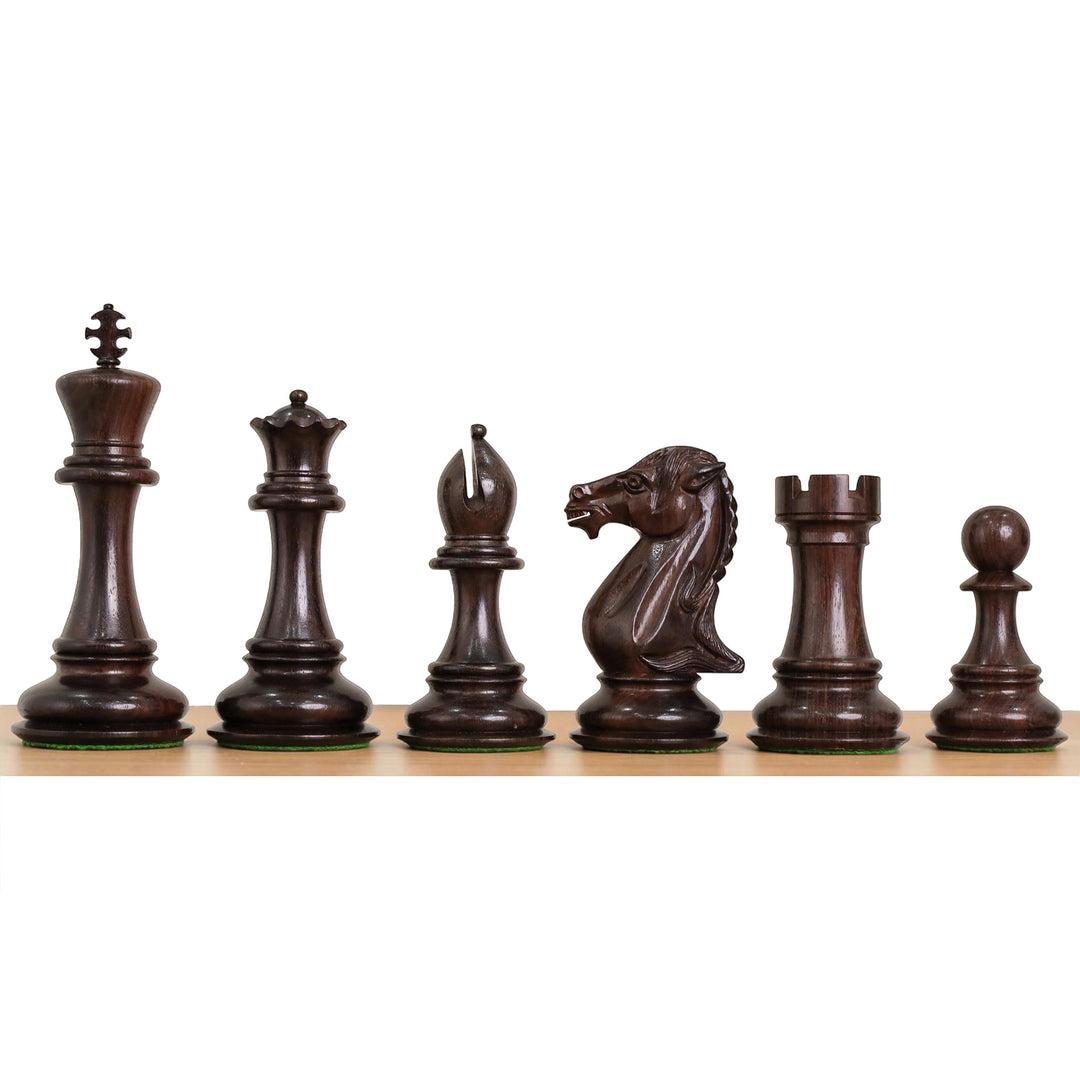 Complete lineup of weighted dark rosewood chess pieces showcasing intricate carving detail.