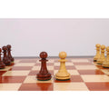 Bud Rosewood and Boxwood Heritage Series Staunton pawns facing each other on the board.