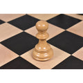 Natural boxwood pawn piece from the 4.6 inch Prestige Luxury Staunton chess set on a board.