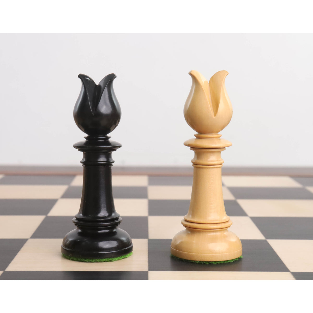 Ebony and boxwood bishop pieces from Edinburgh Northern Upright pre-Staunton chess set.