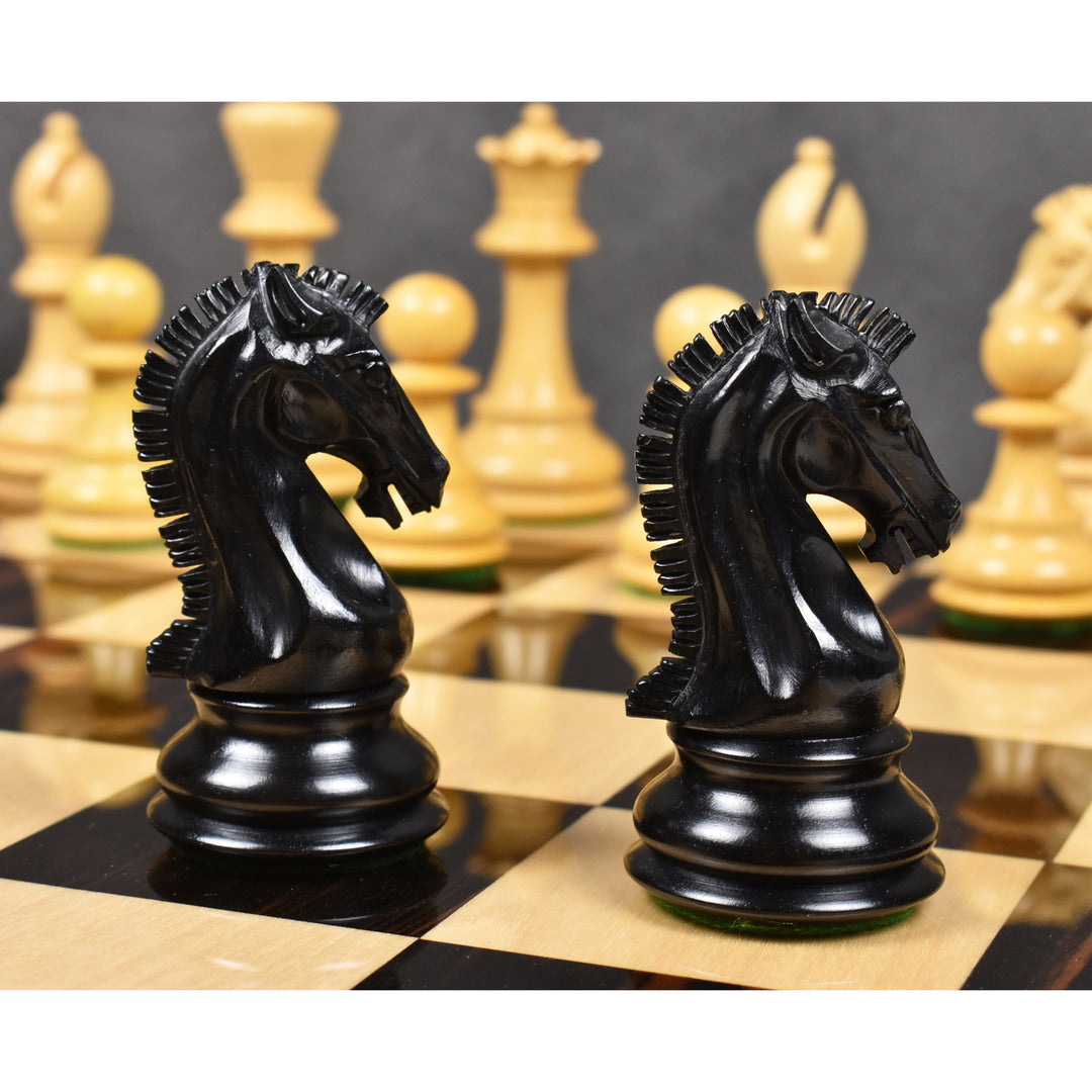 Two hand-carved black ebony wood knight chess pieces from the Craftsman Series.