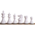 Row of professional white painted Staunton wooden chess pieces with a glossy finish.