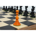 Antiqued boxwood Pre-Staunton pawn on a chess board.