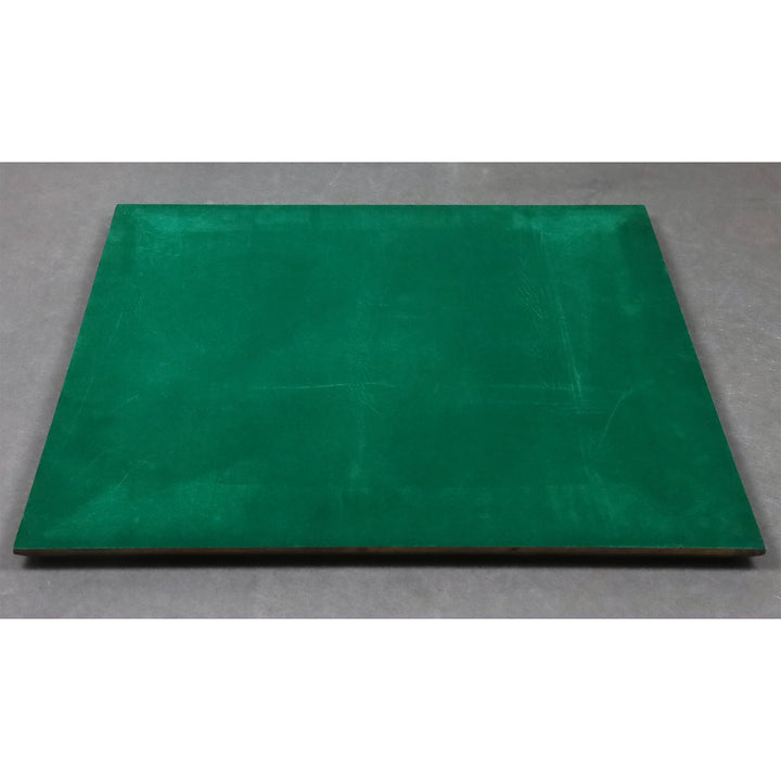 Wooden chessboard bottom view featuring protective green felt backing