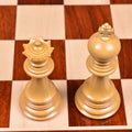 Premium light Boxwood King and Queen chess pieces on a wooden board.