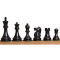 Profile view of the black chess pieces from the 1972 Fischer Spassky set.