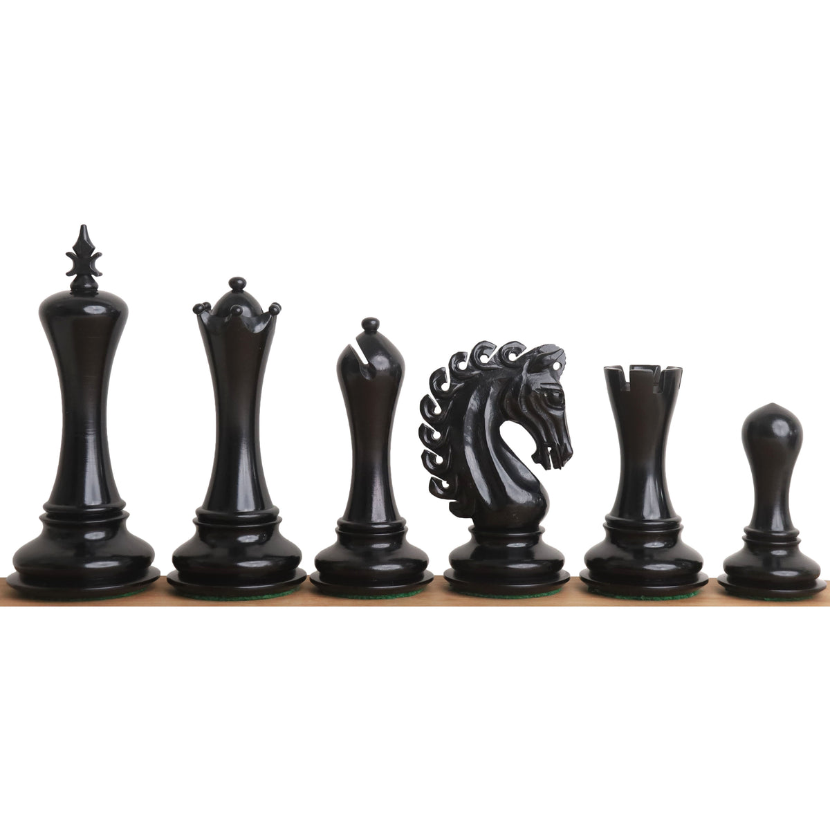 Complete set of premium black ebonized Staunton chess pieces.