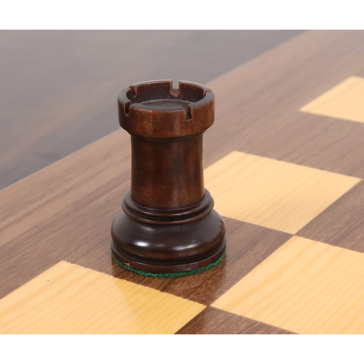 Side perspective of a mahogany stained Fischer Dubrovnik rook chess piece.