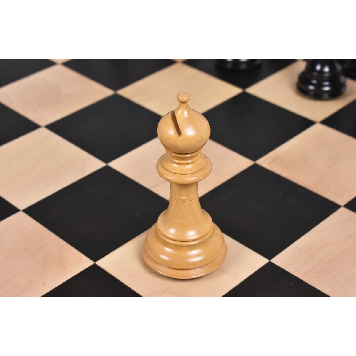 Detailed boxwood bishop chess piece from the 4.6 inch Prestige Luxury Staunton collection.