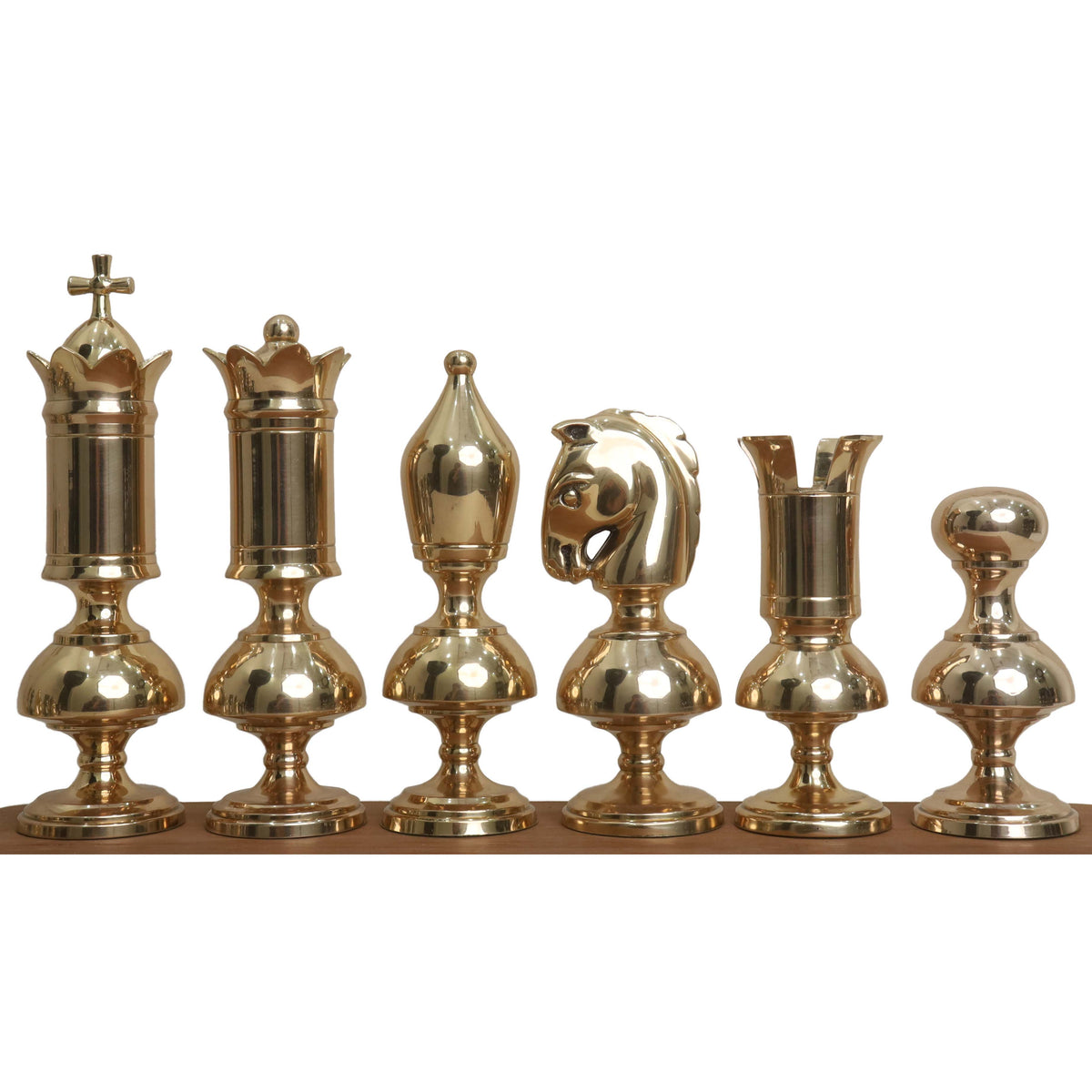 Complete set of gold brass luxury chess pieces from the Giant Victorian series arranged in a row.