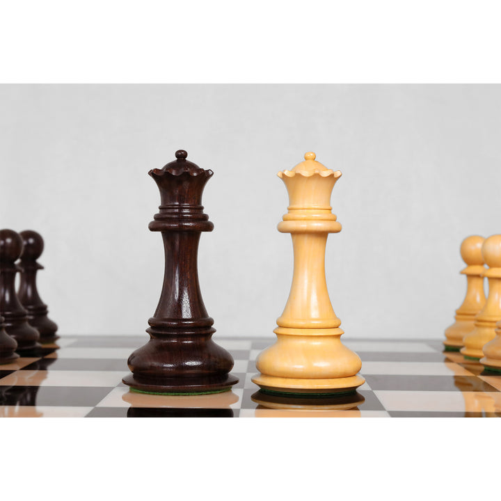 Close-up view of dark and golden rosewood queen chess pieces on the board.