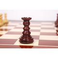 Close-up of a hand-carved bud rosewood rook piece from the Marengo luxury Staunton chess set.