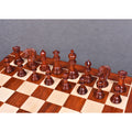 Full arrangement of dark Bud Rosewood Mogul Staunton chess pieces.