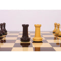 Close up of Rosewood and Boxwood Rook pieces from the 3.9" Heritage Series Staunton Chess Set.