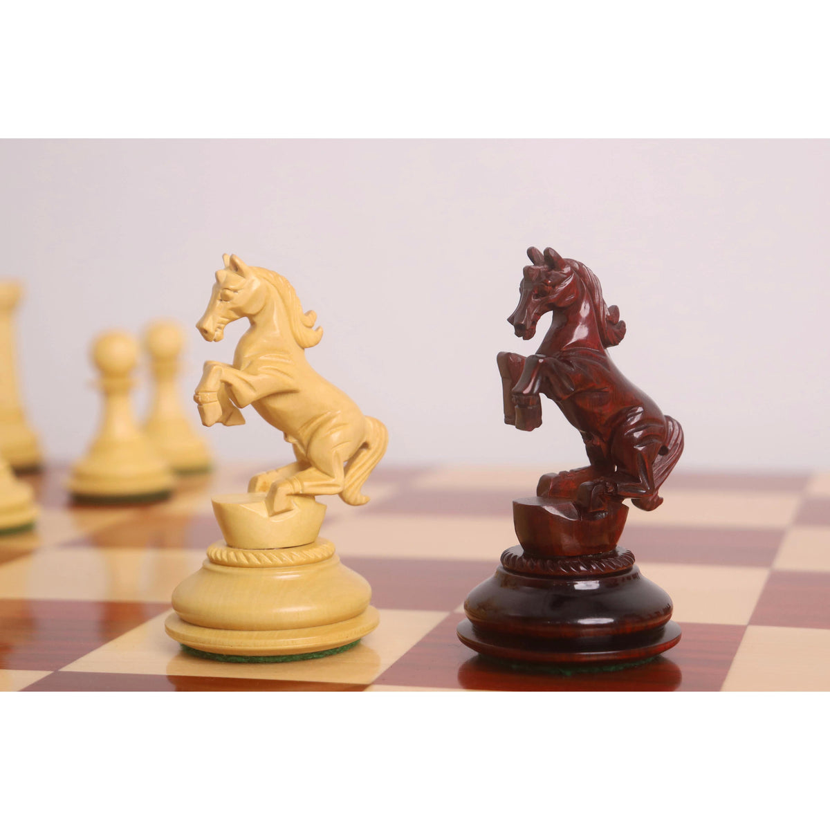 Rearing horse Knights from the 4.5" Incitatus luxury Staunton chess set showing exquisite hand-carved manes and musculature.