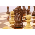 Detailed view of the Boxwood Rook and Pawn pieces, featuring the classic Staunton design with a weighted base.