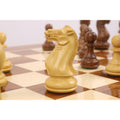 High-angle view of the 23" tournament chess board surface with Pro Staunton pieces in a starting position.