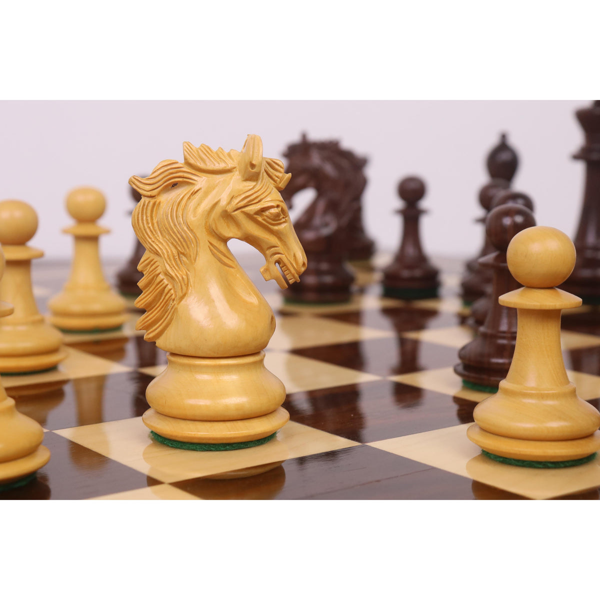 Detailed close up of the carved Boxwood Knight piece from the 3.9" Heritage Series Staunton Chess Set.