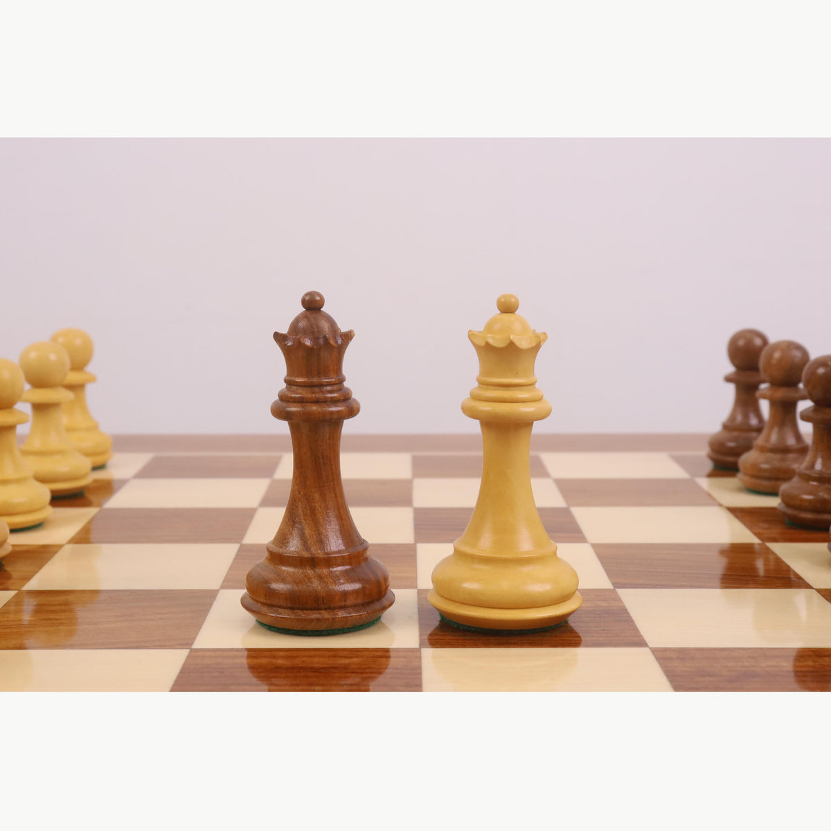 Full view of the handcrafted wooden chess table with drawers, set with Golden Rosewood and Boxwood chess pieces.