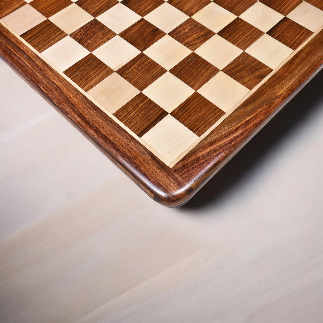 High-quality wood grain texture of a 17 inch golden rosewood and maple inlaid chess board surface.