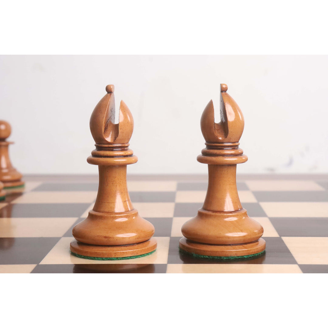 Pair of distressed antiqued boxwood bishops from the 1849 Original Staunton chess set combo.