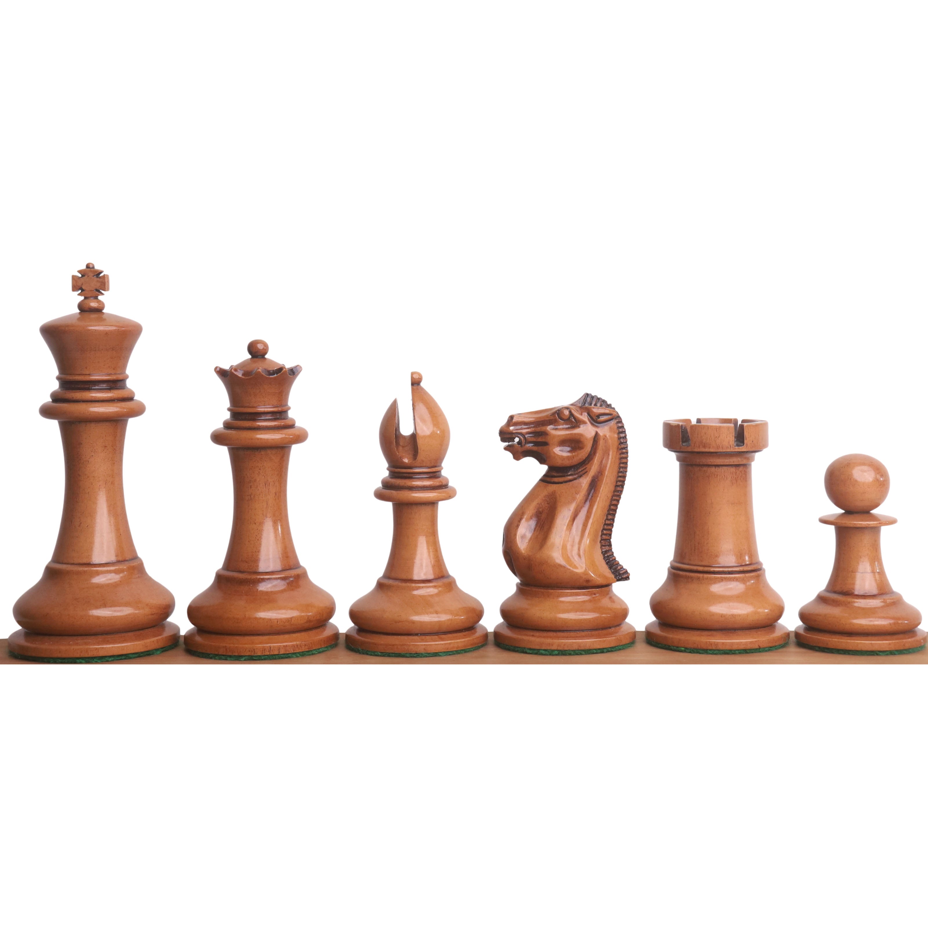 Profile view of the full 1849 Staunton chess piece lineup in distressed antiqued boxwood.