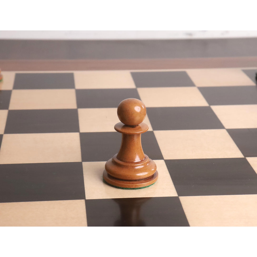 A single 1849 Original Staunton pawn handcrafted in distressed antiqued boxwood with a lacquered finish.