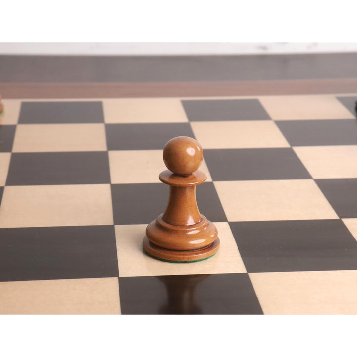 A single 1849 Original Staunton pawn handcrafted in distressed antiqued boxwood with a lacquered finish.
